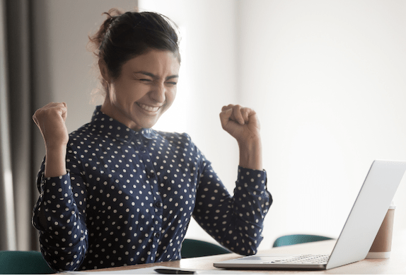 woman excited about blogging success